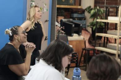 Vanessa looks on