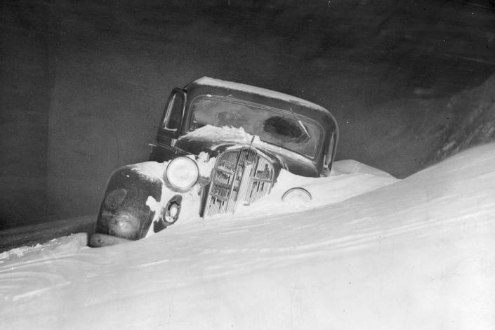 a car trapped in snow