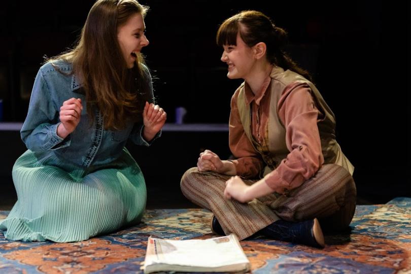 Audrey and Touchstone laughing in As You Like It