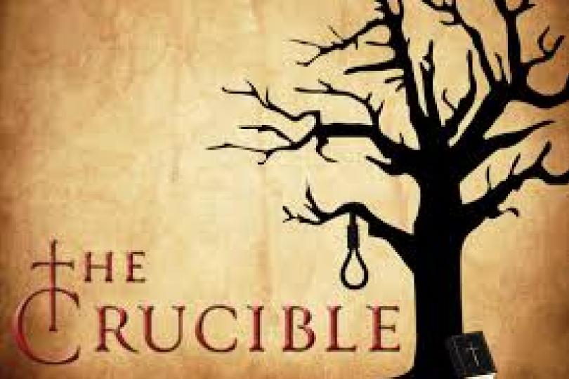 The Crucible in creepy red font, silhouette of a tree in the bakckground