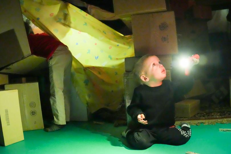 kid with flashlight